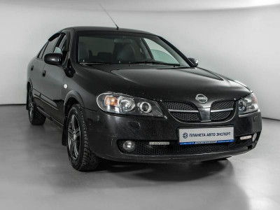 Nissan Almera 1.5 MT (98 л. с.)